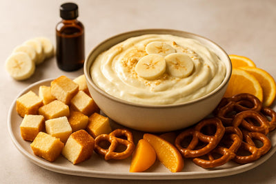 Bowl of banana pudding dip with brioche, pretzels and fruit