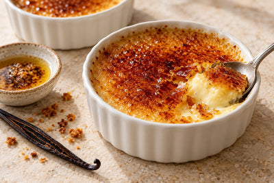 Brown Butter Vanilla Crème Brûlée in a ramekin with a caramelized sugar crust