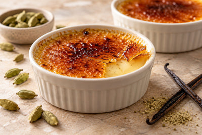 Cardamom Vanilla Crème Brûlée in a ramekin with a caramelized sugar crust