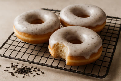 Doughnuts finished with Earl Grey glaze on a cooling rack