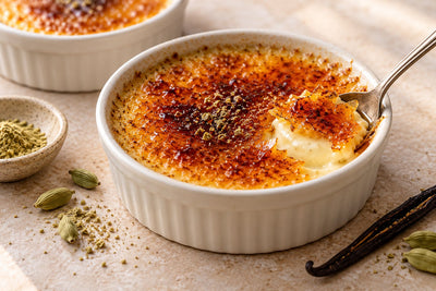 Gluten-Free Cardamom Vanilla Crème Brûlée in a ramekin with a caramelized sugar crust