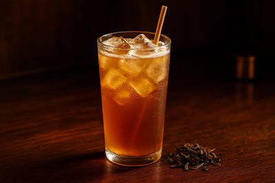 Iced Jasmine Tea in a glass on an oak bar