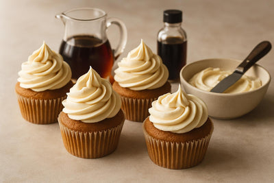 Cupcakes piped with maple cream cheese frosting