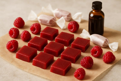 Raspberry Caramels cut and wrapped in wax paper
