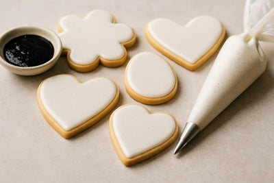 Sugar cookies decorated with vanilla bean royal icing