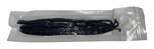 Packaged vanilla beans on a white background