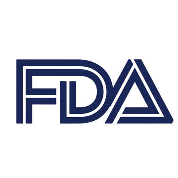 Bottle of pure vanilla extract with FDA-compliant label showing ingredients and alcohol content alongside the federal