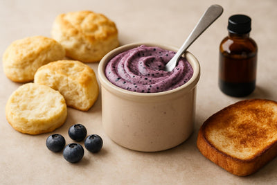 Blueberry Butter in a crock with warm biscuits