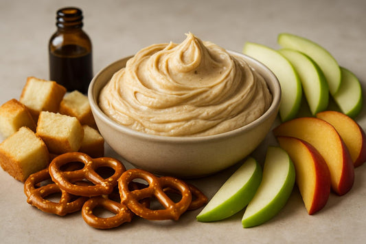 Bowl of brown butter frosting dip with brioche, pretzels and fruit