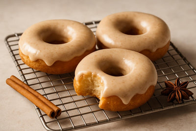 Doughnuts finished with chai glaze on a cooling rack