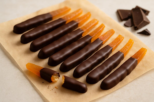 Homemade chocolate dipped orange peel on parchment