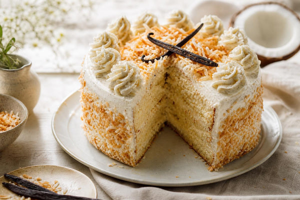 Coconut vanilla layer cake made with Mexican vanilla