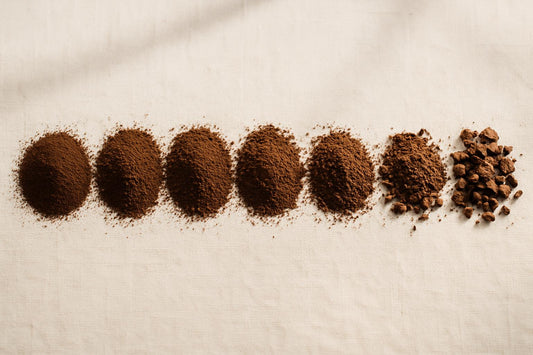 Coffee grind size chart showing seven grind levels from extra-fine Turkish coffee to extra-coarse cold brew