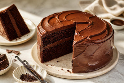 Dairy-free dark chocolate vanilla layer cake made with Tahitian vanilla