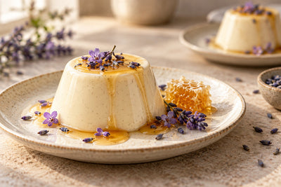 Dairy-Free Honey Lavender Vanilla Panna Cotta, unmolded on a plate with vanilla beans