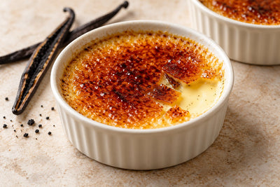 Dairy-Free Vanilla Crème Brûlée in a ramekin with a caramelized sugar crust