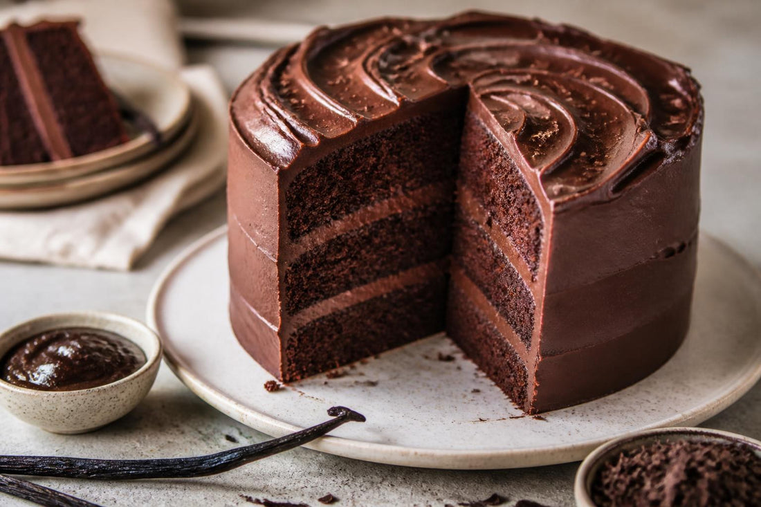 Gluten-free dark chocolate vanilla layer cake made with Ugandan vanilla