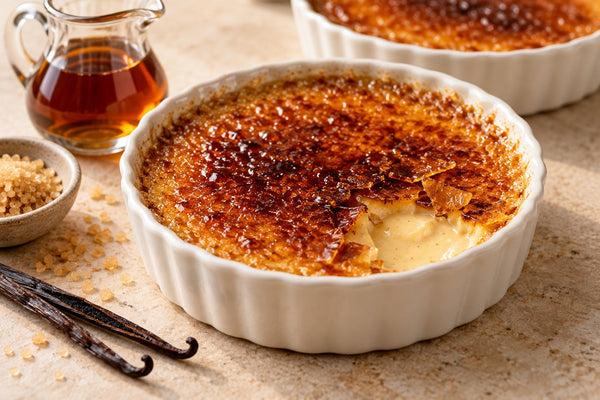 Maple Vanilla Crème Brûlée in a ramekin with a caramelized sugar crust