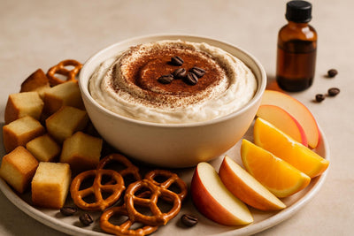 Bowl of tiramisu dip with brioche, pretzels and fruit