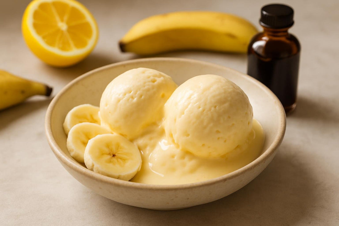 Scoops of vanilla banana lemon custard ice cream in a ceramic bowl