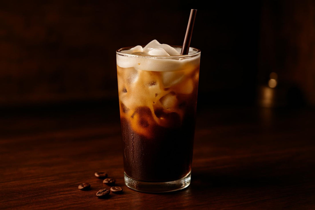 Vanilla Bean Cold Brew in a glass on an oak bar
