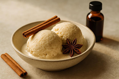 Scoops of vanilla chai spice custard ice cream in a ceramic bowl