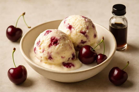 Scoops of vanilla cherry custard ice cream in a ceramic bowl