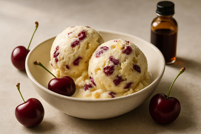 Scoops of vanilla cherry ginger custard ice cream in a ceramic bowl