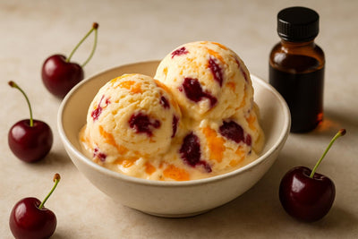 Scoops of vanilla cherry orange custard ice cream in a ceramic bowl