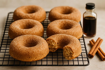 Vanilla Cinnamon Cardamom Cake Doughnuts on a cooling rack