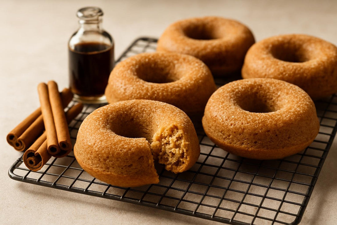 Vanilla Cinnamon Ginger Cake Doughnuts on a cooling rack