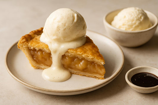 Slice of pie with vanilla ice cream topping