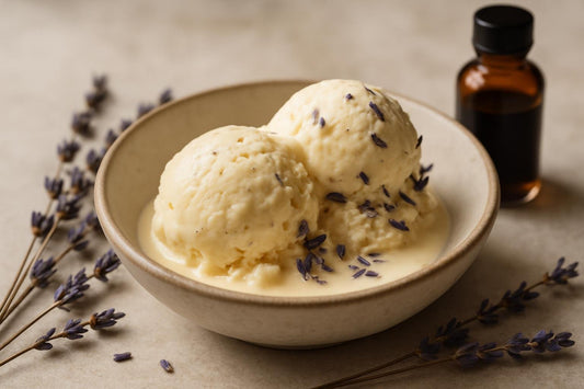 Scoops of vanilla lavender cardamom custard ice cream in a ceramic bowl