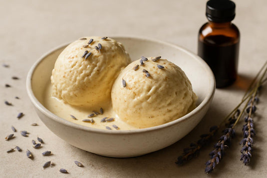 Scoops of vanilla lavender cinnamon custard ice cream in a ceramic bowl