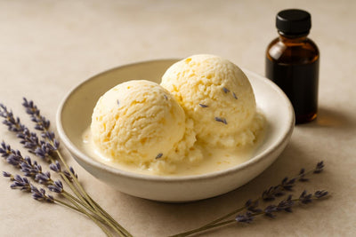 Scoops of vanilla lavender orange custard ice cream in a ceramic bowl