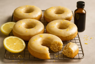 Vanilla Lemon Ginger Cake Doughnuts on a cooling rack