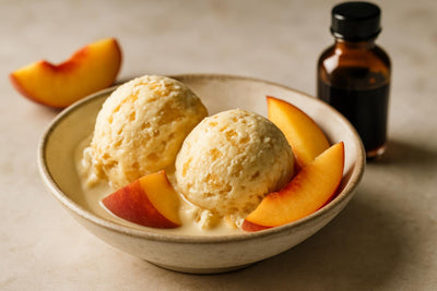 Scoops of vanilla peach cardamom custard ice cream in a ceramic bowl