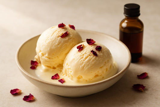 Scoops of vanilla rose custard ice cream in a ceramic bowl