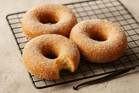 Doughnuts finished with vanilla sugar on a cooling rack