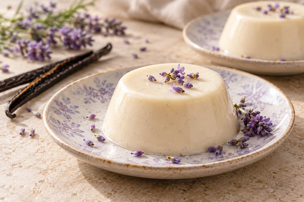 Vegan Lavender Vanilla Panna Cotta, unmolded on a plate with vanilla beans