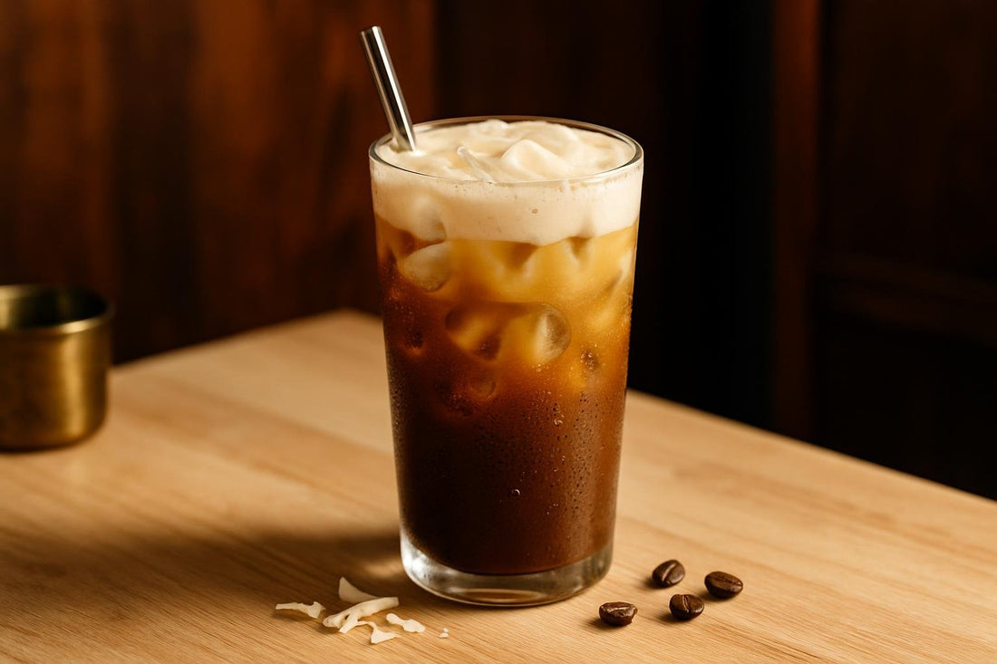 White Chocolate Cold Brew in a glass on an oak kitchen island