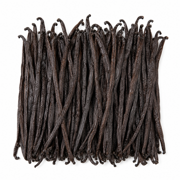 A dense cluster of dark Madagascar vanilla beans arranged in a square shape on a plain white background.