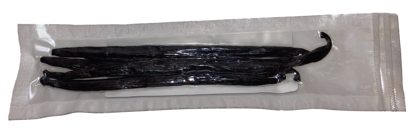 Packaged vanilla beans on a white background