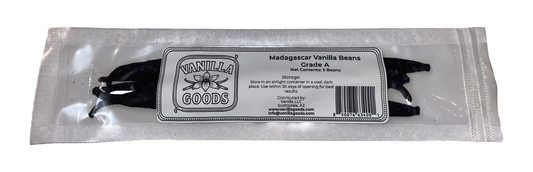 Packaged vanilla beans with 'Vanilla Goods' label on a white background
