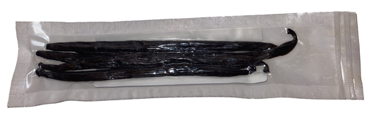 Packaged vanilla beans on a white background