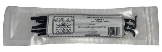 Packaged vanilla beans with Vanilla Goods label on a white background