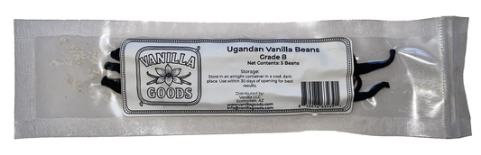 Packaged vanilla beans with 'Vanilla Goods' label on a white background