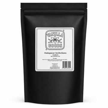 A black resealable stand-up pouch of Madagascar Vanilla Beans from Vanilla Goods, featuring a white label with black text and a vanilla flower illustration, set against a plain white background.