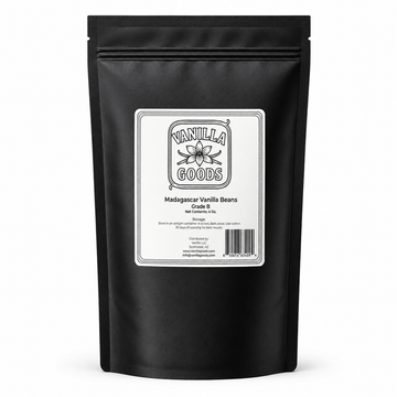 A black stand-up pouch of Madagascar Vanilla Beans Grade B by Vanilla Goods, featuring a white label on the front, set against a plain white background.
