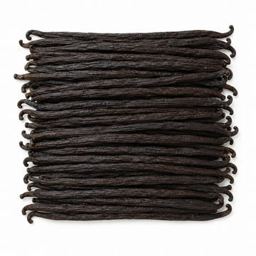 A bundle of dark brown Uganda vanilla beans arranged in a neat rectangular stack on a plain white background.